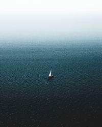 High angle view of sailboat in sea