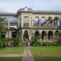 People in front of building