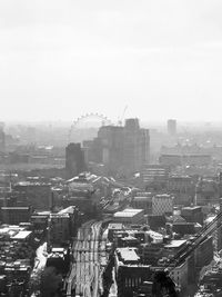 High angle view of buildings in city against sky