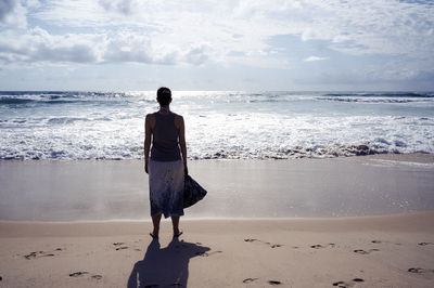 People standing on beach