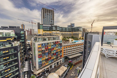 Buildings in city against sky