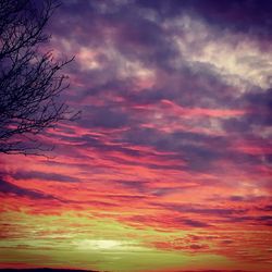 Low angle view of dramatic sky during sunset