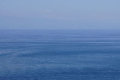 Scenic view of blue sea against sky