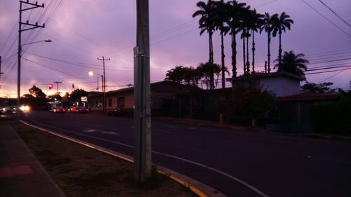 View of city street at dusk