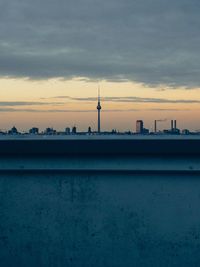 View of buildings against cloudy sky