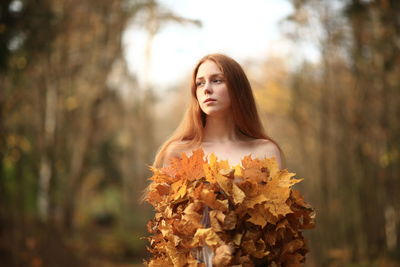 Portrait of woman in a forest