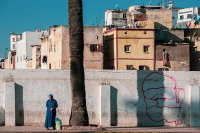 Rear view of man in old building