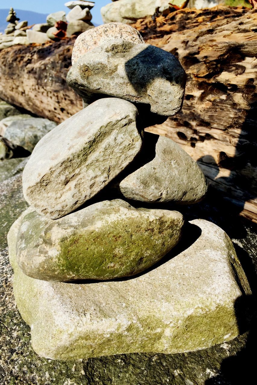 rock - object, stone - object, stone, balance, stack, textured, stone material, human representation, art, art and craft, creativity, sculpture, sunlight, statue, close-up, nature, outdoors, day, rock