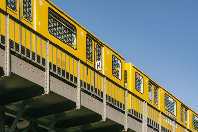 Low angle view of train against clear sky