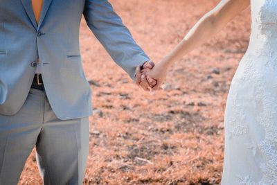 Close-up of hands against blurred background