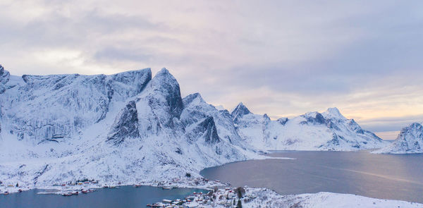 Scenic view of snowcapped mountains against sky