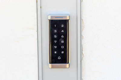 Close-up of telephone on wall