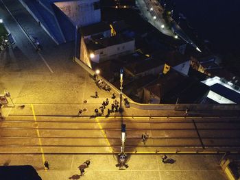 High angle view of people on road at night