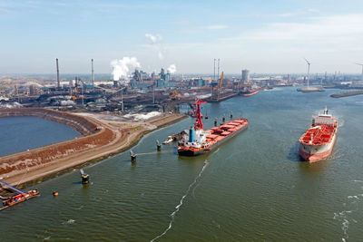 Aerial from heavy industry at ijmuiden ath the north sea canal in the netherlands