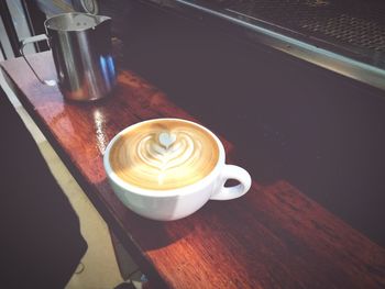 Directly above shot of coffee cup on table