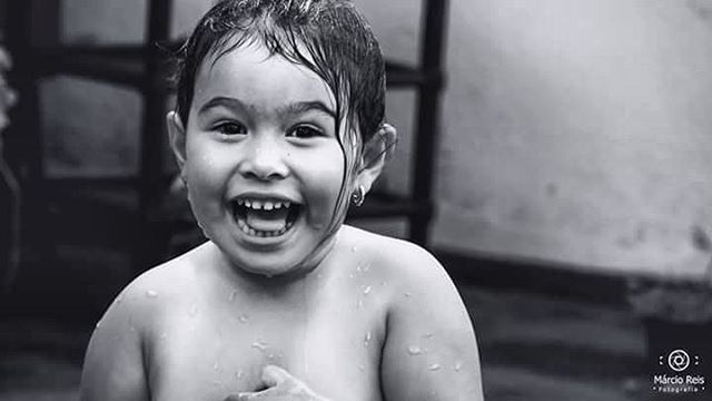 person, looking at camera, portrait, focus on foreground, front view, childhood, close-up, headshot, lifestyles, elementary age, smiling, boys, indoors, leisure activity, happiness, cute, innocence, casual clothing