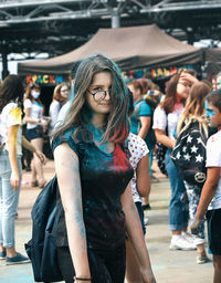 Young woman standing outdoors