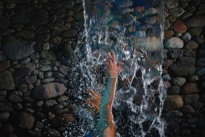 Full frame shot of water falling on rocks