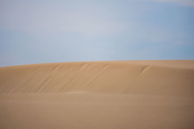 Scenic view of desert against sky