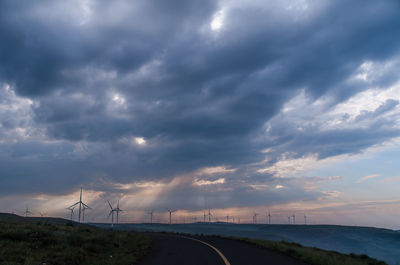 Scenic view of road against sky during sunset