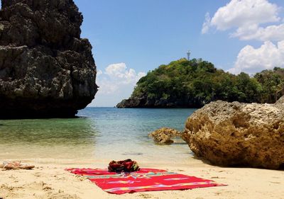 Scenic view of beach against sky