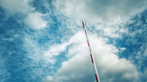 Low angle view of flag against sky