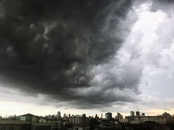 Storm clouds over city