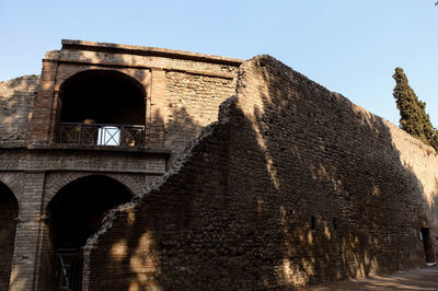 Low angle view of fort against the sky