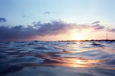 Scenic view of sea at sunset