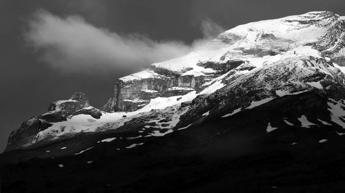 Scenic view of snow covered mountain against sky