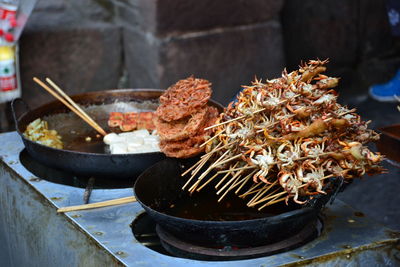 Close-up of meat on barbecue grill