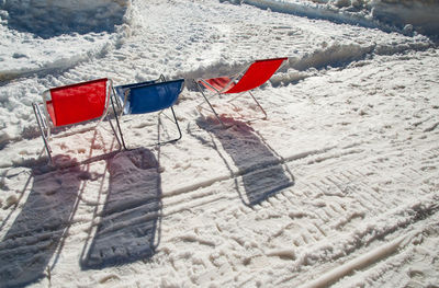 Low angle view of flags on beach