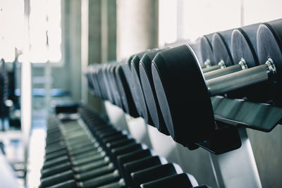 Close-up of dumbbells in gym