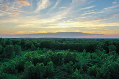 Scenic view of landscape against sky during sunset