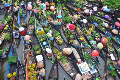 High angle view of decorations hanging in market for sale