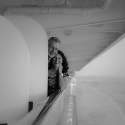 Portrait of couple on boat in sea