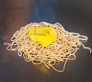 High angle view of yellow bread on table