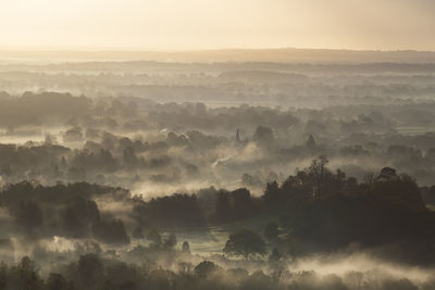 Panoramic view of landscape against sky during sunset