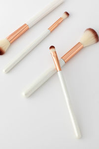 High angle view of chopsticks on white background