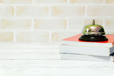 Books and bells on table