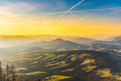 Scenic view of mountains against sky during sunset