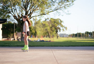 Portrait of little girl skating