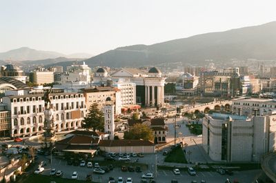 High angle view of buildings in city against sky