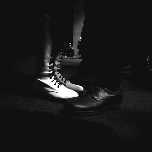 Low section of man standing on floor