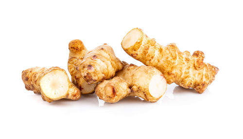 High angle view of meat on white background