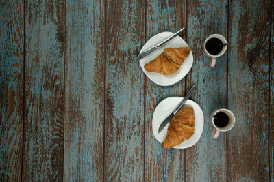 High angle view of coffee cup on table