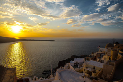 High angle view of town at sunset