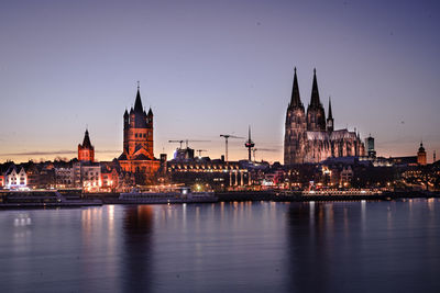 Illuminated buildings in city at night