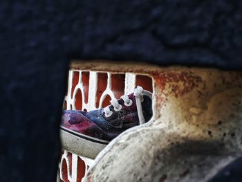 Low section of person standing on old floor