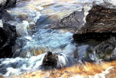 Scenic view of rocks in sea